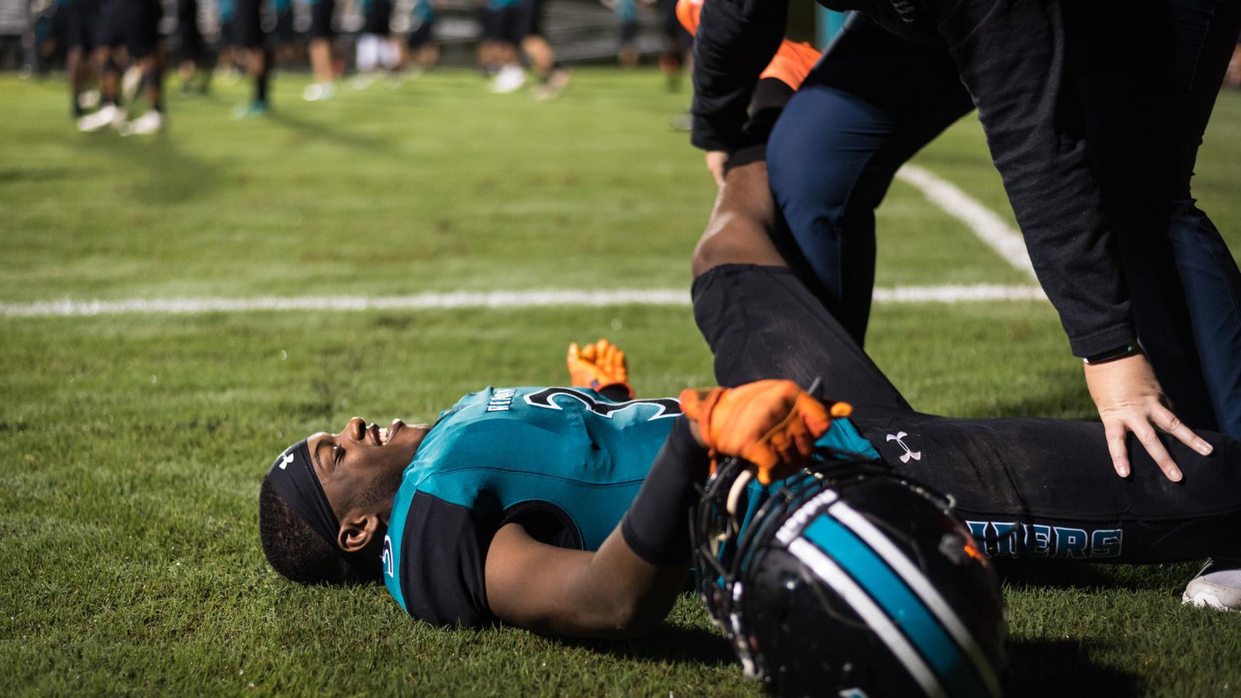 Athletic trainers at Guilford County Schools miss sports, too